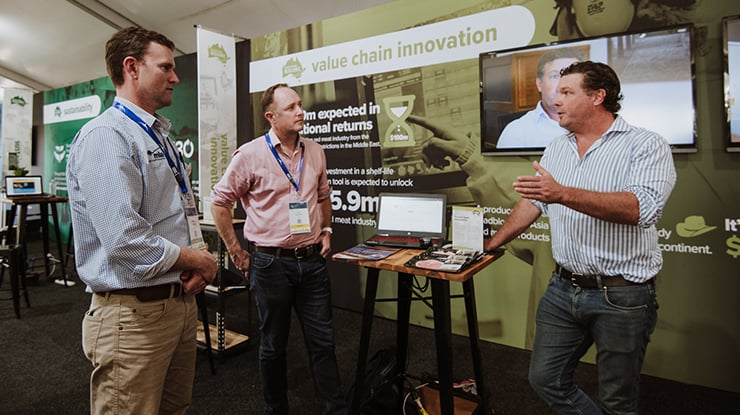 Lachlan Graham (far right) from Argyle Food Group speaks with MLA General Manager - Research, Development and Adoption, Michael Crowley (left), and KPMG’s Ben van Delden (centre).